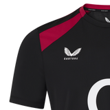Close-up of the black England 26/27 Performance Training Tee by Castore, featuring red shoulder detail, Castore logo and brand name on the chest. Designed with moisture-wicking technology for comfort during intense sessions.