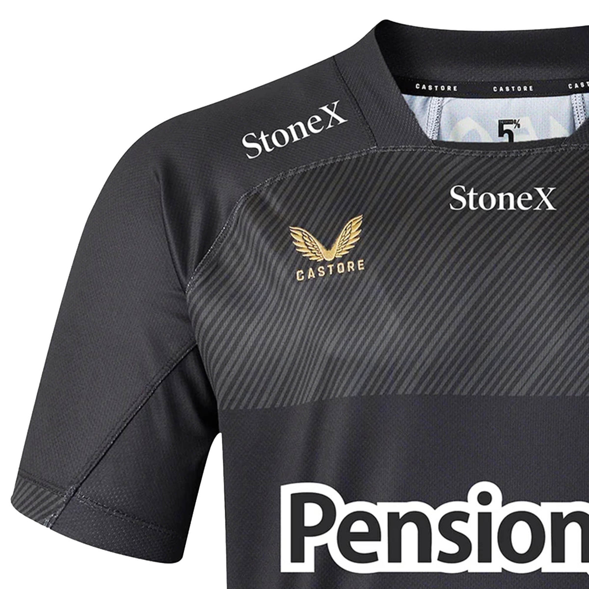 Close-up of the Saracens 26/27 Replica Home Jersey by Castore in black, highlighting the Castore logo, “StoneX” text, and a partial view of “Pension” on the front—showcasing details from the official 2026/27 home shirt.