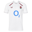 Wear your pride with the England 26/27 Replica Home Jersey by Castore—an official England Rugby jersey featuring a crisp white short-sleeve design, the iconic red rose crest, bold blue “O2” sponsor logo, and striking maroon accents on the collar and shoulders.