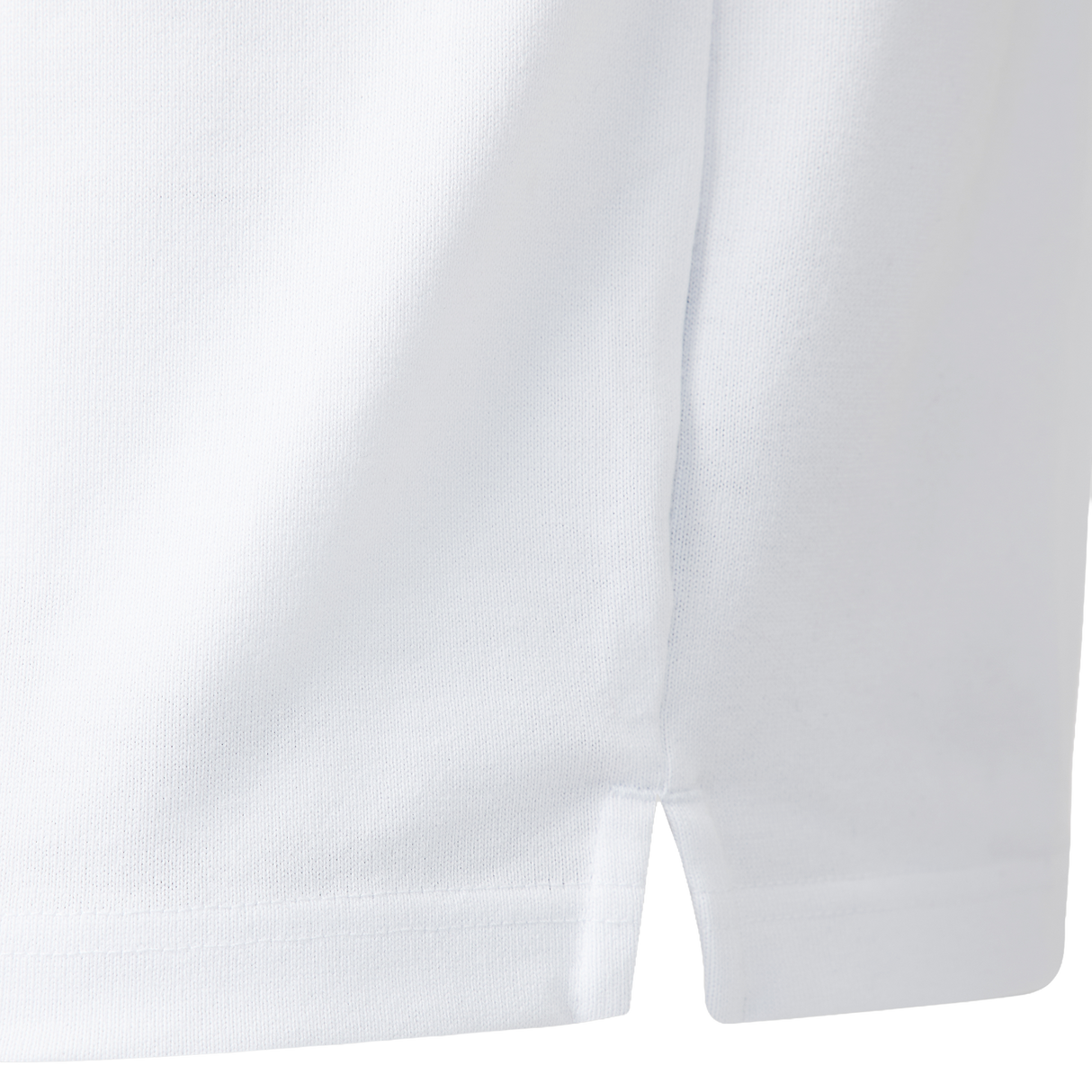 Close-up of the hem on the England 26/27 Classic Home Jersey by Castore, featuring a small side slit and smooth, clean stitching reminiscent of traditional rugby shirts.