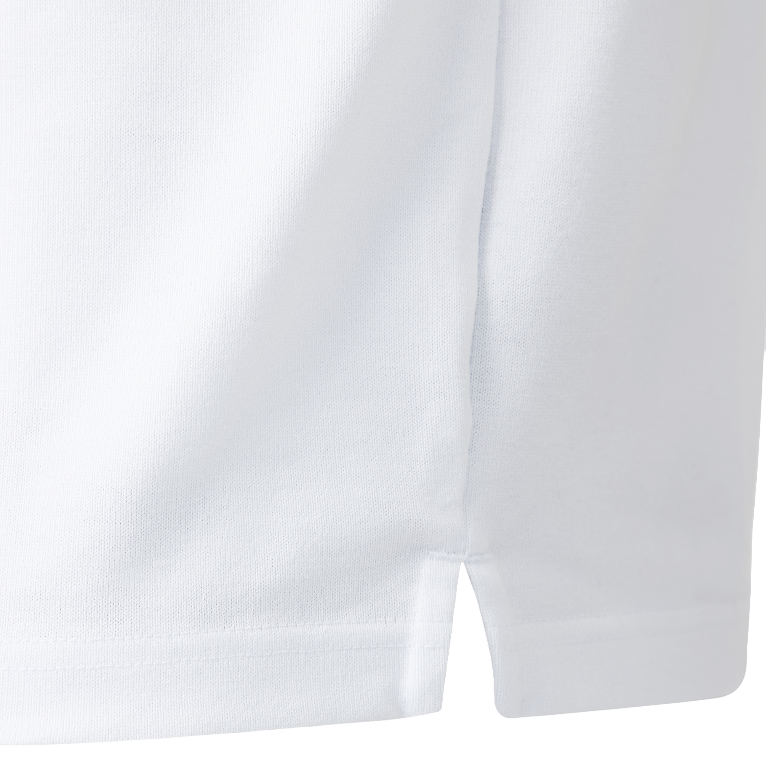 Close-up of the hem on the England 26/27 Classic Home Jersey by Castore, featuring a small side slit and smooth, clean stitching reminiscent of traditional rugby shirts.