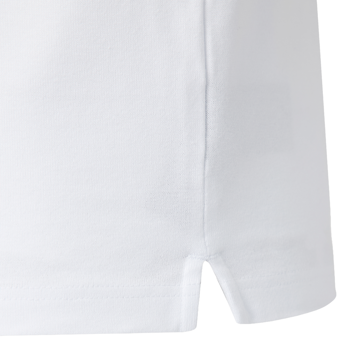 Close-up of a white fabric garment with a side seam and small hem slit—details featured on the Castore England 26/27 Classic Long Sleeve Home Jersey.