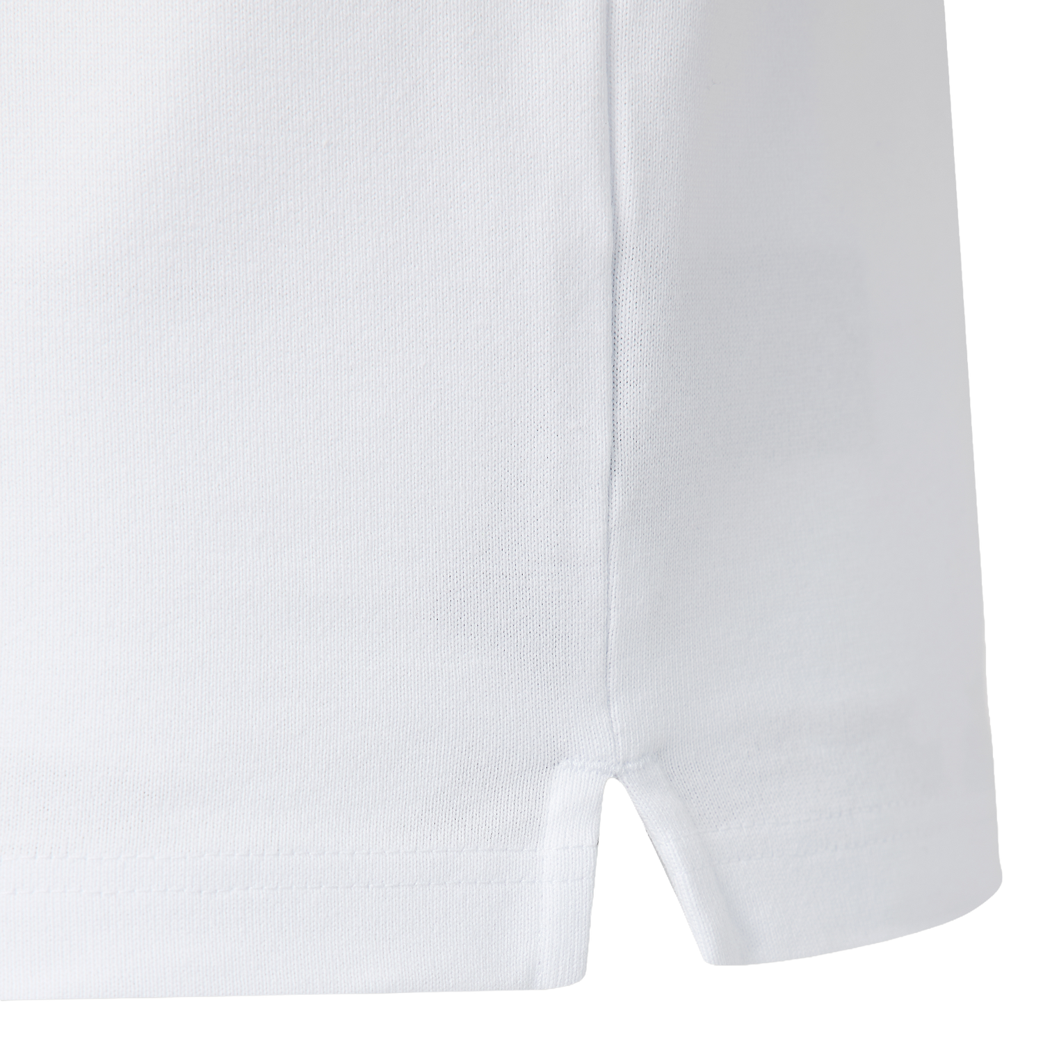 Close-up of a white fabric garment with a side seam and small hem slit—details featured on the Castore England 26/27 Classic Long Sleeve Home Jersey.