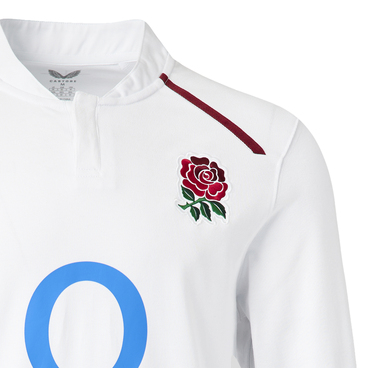 The England 26/27 Classic Long Sleeve Home Jersey by Castore features a red rose chest emblem, maroon shoulder stripe, and a bold blue "O" partly shown on the front.