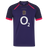 The England 26/27 Replica Alternate Jersey by Castore is a short-sleeved, dark purple shirt with pink accents, showcasing the iconic rugby rose crest and a bold white “O2” sponsor logo on the front—a standout from Castore’s Rhodonite alternate kit collection.
