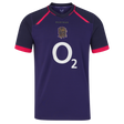 The England 26/27 Replica Alternate Jersey by Castore is a short-sleeved, dark purple shirt with pink accents, showcasing the iconic rugby rose crest and a bold white “O2” sponsor logo on the front—a standout from Castore’s Rhodonite alternate kit collection.