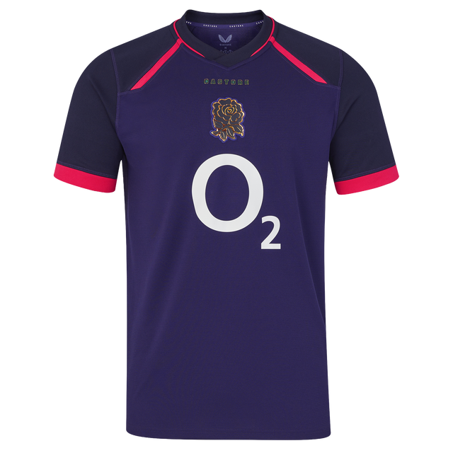 The England 26/27 Replica Alternate Jersey by Castore is a short-sleeved, dark purple shirt with pink accents, showcasing the iconic rugby rose crest and a bold white “O2” sponsor logo on the front—a standout from Castore’s Rhodonite alternate kit collection.