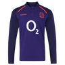 The England 26/27 Classic Long Sleeve Alternate Jersey by Castore features dark purple fabric, a red rose emblem, white O2 sponsor logo, and red Castore branding—ideal for England rugby fans.