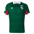 The Leicester 26/27 Replica Home Jersey by Castore features a green short-sleeved design with a white collar, red underarm panels, and distinctive logos such as Castore, Breedon, and a tiger emblem on the chest. This replica jersey by Castore authentically mirrors the official Leicester Tigers home kit for the 2026/27 season.