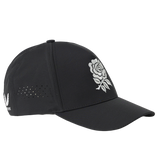 Introducing the England 26/27 Team Cap by Castore—a black baseball cap inspired by the iconic England Rugby headwear, featuring a white rose emblem on the front panel, small ventilation holes on the side, and signature Castore quality.