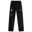 The Valley Panthers Rugby Cuffed Hem Stadium Pant by EMB Canterbury features black stadium pants with cuffed hems, an elastic waistband, and a white Canterbury logo and text on the left leg. A small purple graphic enhances the sporty style and classic rugby pant aesthetics.