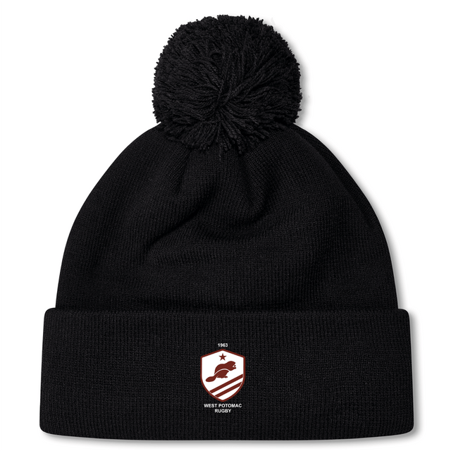 The West Potomac RFC Pom Pom Beanie by EMB Canterbury is a black, fleece-lined knit hat featuring a pom-pom on top and a red and white West Potomac Rugby logo on the front cuff.