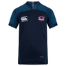 The Nebraska Rugby Referee Society Vapodri Evader Jersey by EMB Canterbury is a navy blue short-sleeve jersey with moisture-wicking technology, Nebraska logos on the chest, and "Vapodri" near the hem for comfort on and off the field.