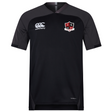 The Southern Pines Youth Rugby Vapodri Evader Jersey by EMB Canterbury is a black short-sleeve jersey featuring the Canterbury logo on the right and a shield emblem on the left. Designed with VapoDri technology, it keeps you cool and dry.