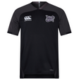 The Valley Panthers Girls Rugby Vapodri Evader Jersey by EMB Canterbury is a black, short-sleeved performance rugby shirt featuring the Valley Panthers Girls Rugby logo on the chest, a Canterbury brand logo, and subtle dark gray shoulder panels. Designed with moisture-wicking Vapodri technology for high performance both on and off the field.