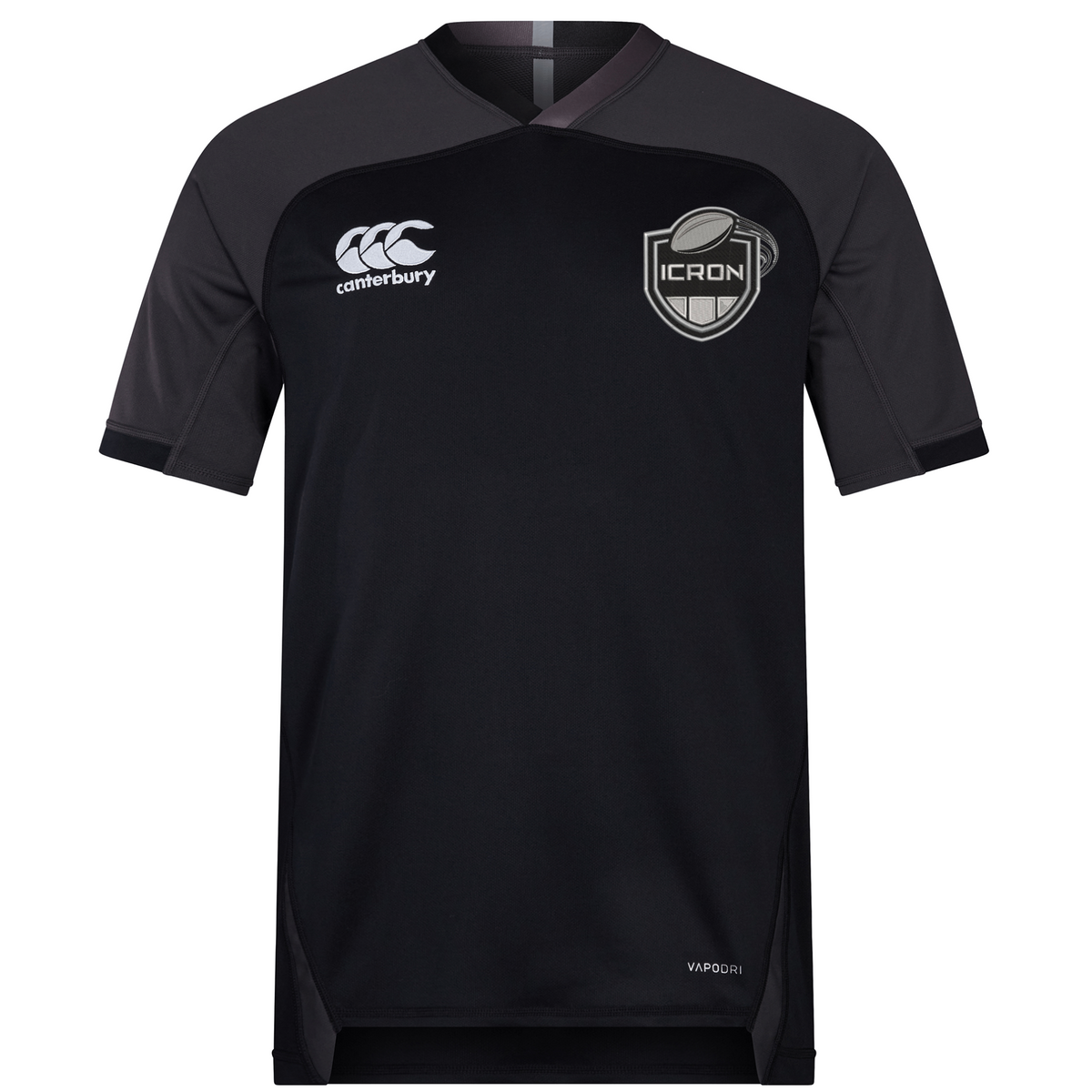 Short-sleeved black ICRON Vapodri Evader Jersey by Canterbury with a V-neck, featuring a logo on the left chest and “VAPODRI” branding on the bottom hem.