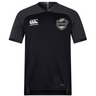 Short-sleeved black ICRON Vapodri Evader Jersey by Canterbury with a V-neck, featuring a logo on the left chest and “VAPODRI” branding on the bottom hem.