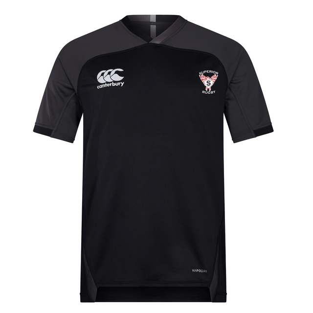A black Superior Rugby Club Vapodri Evader Jersey by EMB Canterbury, featuring short sleeves and "Canterbury" plus "Salford Red Devils" logos on the chest. Made with moisture-wicking Vapodri tech, shown on a plain white background.
