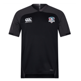 The SWFL Lady Hammerheads Vapodri Evader Jersey by WRS Canterbury features black short sleeves, dark gray sleeves, moisture-wicking tech, a Canterbury logo, and a USA Hammers crest—ideal for Rugby World Cup fans.