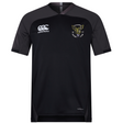 Short-sleeved black Hornets Rugby Club 1977 Vapodri Evader Jersey by EMB Canterbury, featuring grey shoulders and moisture-wicking Vapodri fabric for enhanced comfort. The jersey includes the EMB Canterbury logo on the right chest and a hornet emblem with "Hornets Rugby Club 1977" on the left chest.