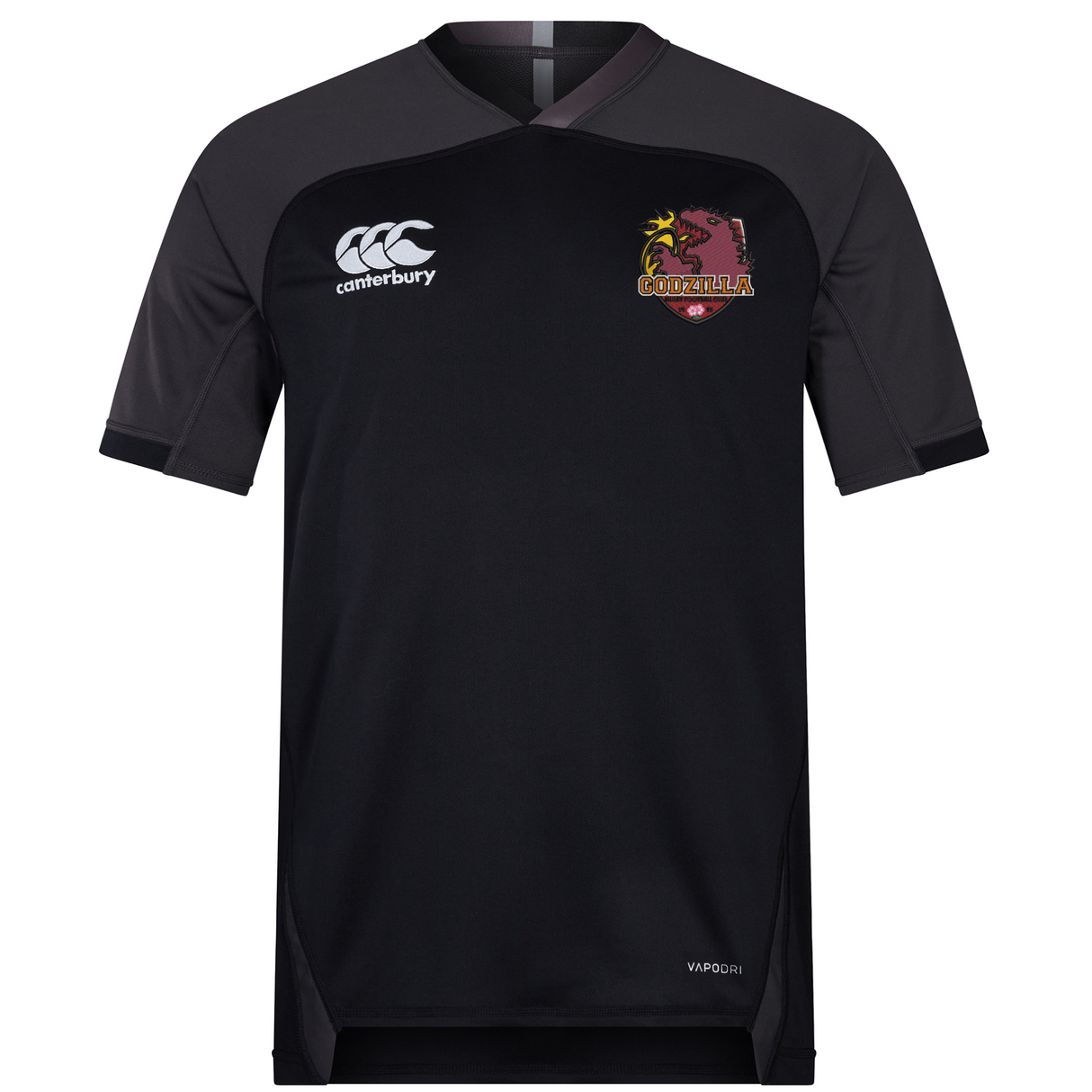 The Godzilla Rugby Football Club Vapodri Evader Jersey by EMB Canterbury is a black short-sleeve rugby jersey featuring the EMB Canterbury logo on the right chest and the maroon and yellow Godzilla RFC logo on the left chest. Constructed with advanced moisture-wicking technology, this jersey also showcases the “VapoDri” text near the bottom.