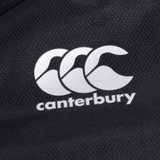A Canterbury logo on a black Canterbury Pro II Vaposhield Full-Zip Water Resistant Jacket.