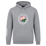 The Society of Iowa Rugby Referees Club Hoodie by Canterbury from WRS Canterbury is a gray hooded sweatshirt with a front pocket, featuring a circular emblem with pink flowers and text, plus a white logo on the right sleeve—a stylish and comfortable customizable hoodie, perfect for fans seeking a unique Rugby Club Hoodie.