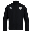 The South Orange County Raptors Club Track Jacket by Canterbury, from EMB Canterbury, is a black lightweight jacket featuring a front zipper, the white Canterbury logo on the right chest, and a bird crest badge on the left chest. Designed with long sleeves and a stand-up collar, it also offers water repellent properties for enhanced practicality.