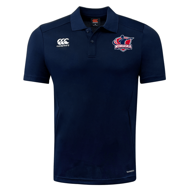 The Nebraska Rugby Referee Society Club Dry Polo by EMB Canterbury is a navy short-sleeve polo featuring a Nebraska logo, Canterbury branding, and Vapodri technology for all-day breathable comfort.