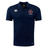 The SF CDME Rugby Club Dry Polo by Canterbury is a navy blue short-sleeve polo featuring a collar and Vapodri Technology for superior comfort and moisture management. Designed for breathability, this EMB Canterbury shirt displays the Canterbury logo on the right chest and a cross emblem with "CDME RUGBY" on the left chest.
