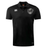 Black ICRON Club Dry Polo by Canterbury with a collar, three-button placket, and a chest crest featuring a rugby ball and the word “ICRON.”