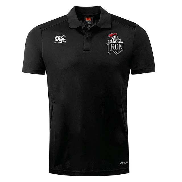 The Birmingham Iron Women's Football Club Dry Polo by EMB Canterbury is a black, short-sleeve collared polo featuring Vapodri technology, a white Canterbury logo on the right chest, and the Iron team crest on the left.
