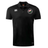 Society of Iowa Rugby Referees Club Dry Polo by EMB Canterbury in black, featuring short sleeves, the iconic Canterbury logo on the right chest, and a round floral emblem on the left chest. Made with Vapodri Technology, this breathable polo keeps you cool and comfortable all day.