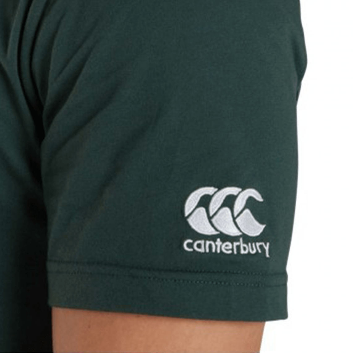 Wearing the WRS Canterbury Pennsylvania CCC Flag Club T-shirt, this person displays true rugby state pride with its dark green color and the white Canterbury logo and text embroidered on the sleeve.