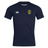 The Gotham Knights Club Dry Tee by Canterbury is a navy blue sports jersey with a white "Canterbury" logo on the right chest and a yellow and green emblem on the left chest. Crafted with Vapodri Technology, it ensures optimal performance and comfort.