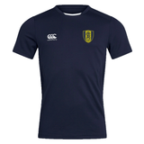 The Gotham Knights Club Dry Tee by Canterbury is a navy blue sports jersey with a white "Canterbury" logo on the right chest and a yellow and green emblem on the left chest. Crafted with Vapodri Technology, it ensures optimal performance and comfort.