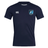 The Minneapolis Mayhem Rugby Club Dry Tee by EMB Canterbury is a navy blue short-sleeve sports jersey featuring the “Canterbury” logo on the right chest and the “Minneapolis Mayhem” badge on the left chest. Designed as a breathable workout tee, it incorporates Vapodri Technology to keep you cool and dry during intense training sessions.