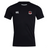 The Southern Pines Youth Rugby Club Dry Tee by EMB Canterbury is a black jersey with a Canterbury logo on the right chest and a shield emblem on the left. It features Vapodri Technology for quick drying and breathable comfort.