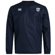 The Milwaukee Barbarians Rugby Club Vaposhield Contact Top by EMB Canterbury is a navy blue, water-repellent, long-sleeve rugby training top featuring the Canterbury logo on the right chest and club crest on the left.