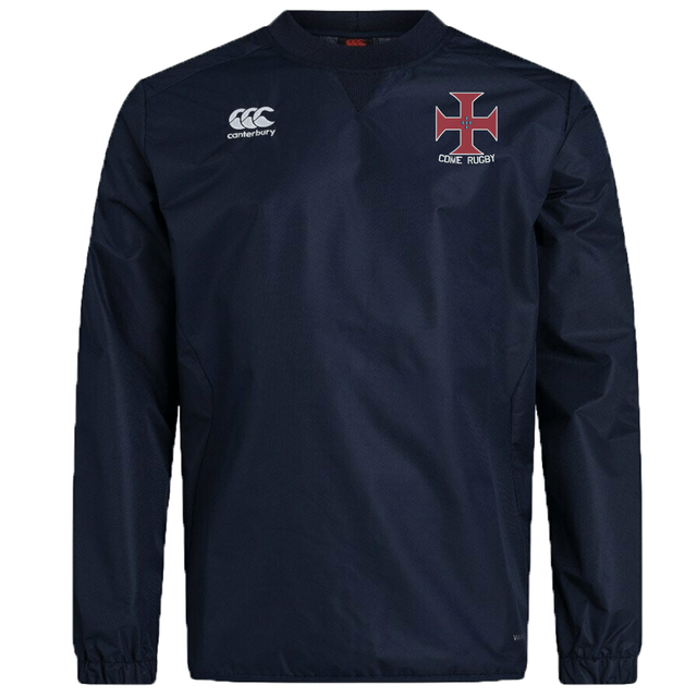 Introducing the SF CDME Rugby Club Vaposhield Contact Top by EMB Canterbury—a navy blue, long-sleeve training pullover featuring the Canterbury logo on the right chest and a striking red cross emblem with "CDME Rugby" text on the left chest. This water-repellent top is designed to keep you comfortable and dry during intense rugby sessions.