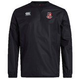 The Rye High School 10 Year Club Vaposhield Contact Top by EMB Canterbury is a black, long-sleeve athletic jacket featuring a crest logo on the chest and the Canterbury logo on the shoulder. Specifically designed as a Rugby Club Top, it includes Vaposhield technology for water-repellent protection.