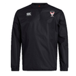 The Superior Rugby Club Vaposhield Contact Top by EMB Canterbury is a black long-sleeve top featuring the Canterbury logo on the right chest and a shield "SALFORD" emblem on the left. Designed with Vaposhield tech for wet weather training.