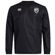 The South Orange County Raptors Club Vaposhield Contact Top by EMB Canterbury is a black, long-sleeve sports jacket featuring a white Canterbury logo on the right chest and a shield emblem with a bird on the left chest. Designed as a water-repellent training top, this contact top is perfect for rugby club sessions in wet weather.