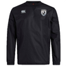 The South Orange County Raptors Club Vaposhield Contact Top by EMB Canterbury is a black, long-sleeve sports jacket featuring a white Canterbury logo on the right chest and a shield emblem with a bird on the left chest. Designed as a water-repellent training top, this contact top is perfect for rugby club sessions in wet weather.