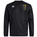 The Spartan Youth Rugby Club Vaposhield Contact Top by EMB Canterbury is a black long-sleeve top featuring the Canterbury logo on the right chest and a yellow Spartan Sports Academy logo on the left, with Vaposhield technology for comfort.