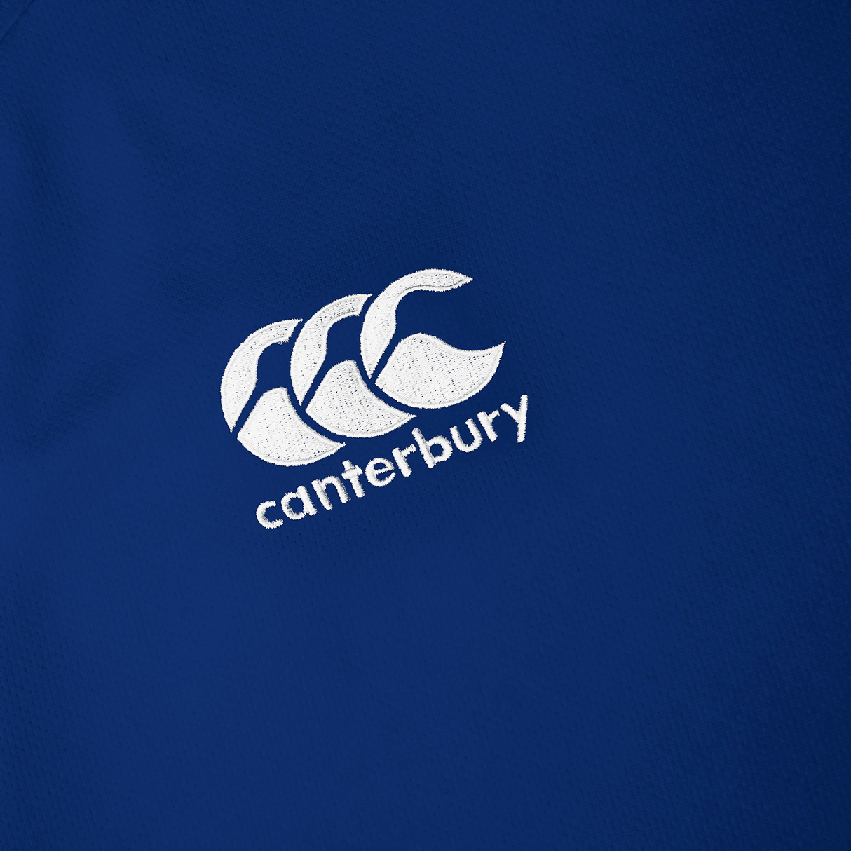 A Canterbury Club Dry Tee with a white logo on it.