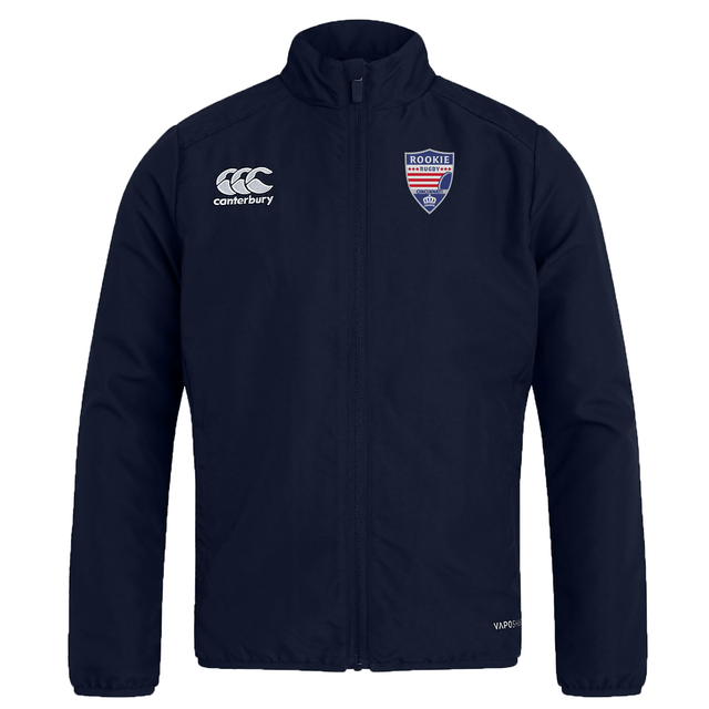 A lightweight navy blue Cincinnati Rookie Rugby Club Track Jacket by EMB Canterbury featuring the Canterbury logo on the right chest and a shield-shaped "Rookie" logo on the left chest. The jacket has a front zipper, a high collar, and is water-repellent.