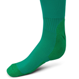 A close-up of the Ireland 25/26 Home Socks by Canterbury, worn on a foot, highlighting the ribbed texture and reinforced heel and toe areas.
