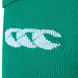 Close-up of green knitted fabric with a white Canterbury logo, highlighting the quality of the Ireland 25/26 Home Socks by Canterbury.