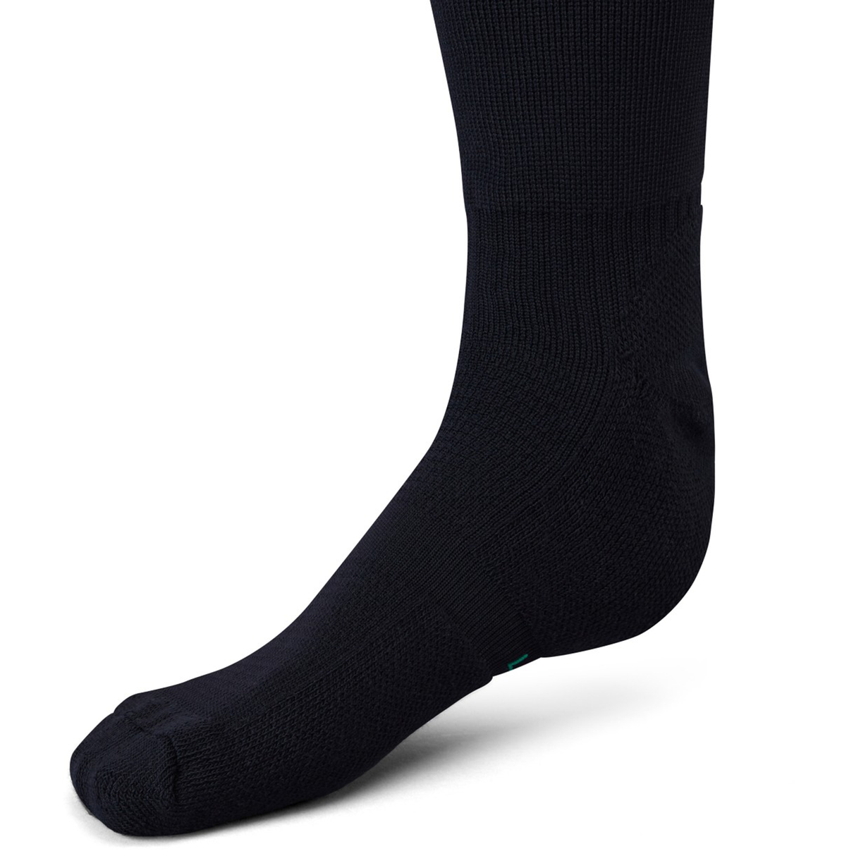 A close-up of a foot and lower leg wearing Canterbury Ireland 25/26 Alternate Socks, featuring ankle and arch support, photographed against a white background.